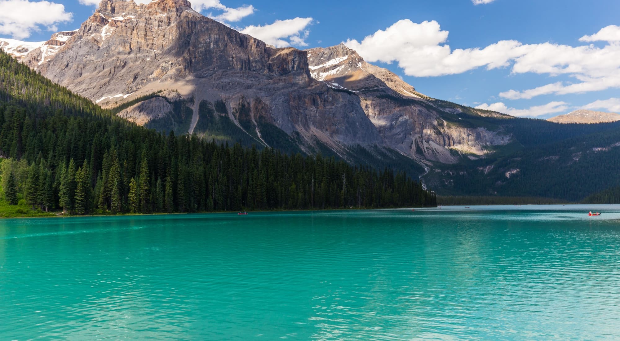Emerald Lake in Yoho National Park, turquoise water below a steep grey mountain face